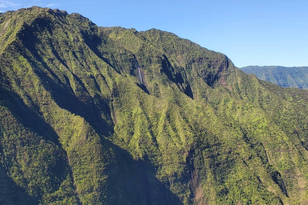 iflykauai kauai helicopter photo excursion tour waterfall on top of mountain