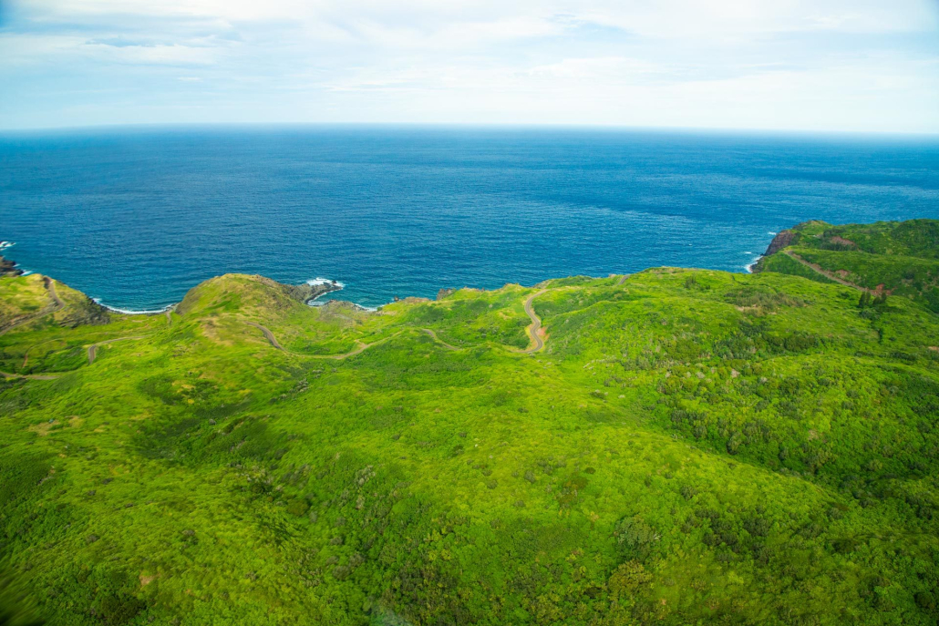 a helicopter tour takes you over the north coast of maui
