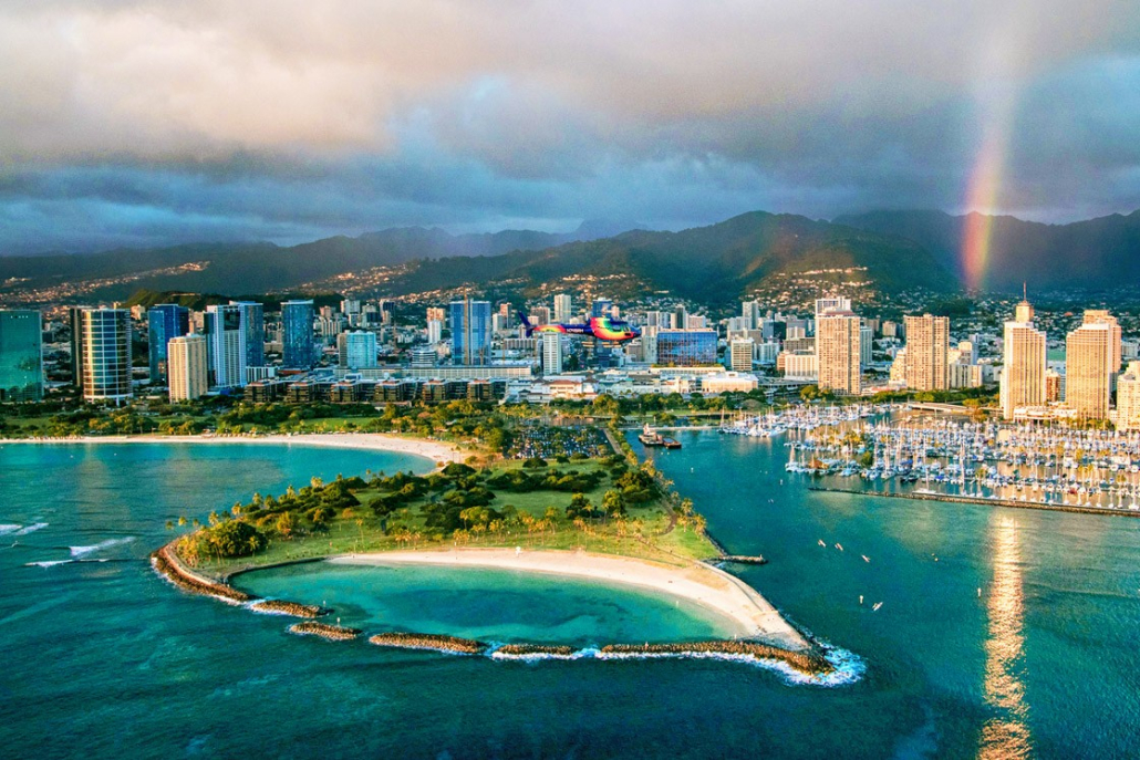experience the beauty of waikiki from a helicopter as the sun sets rainbow helicopters oahu hawaii