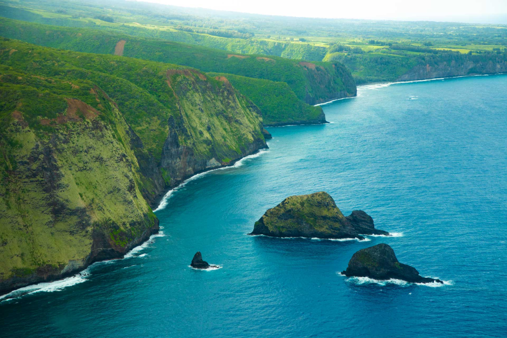 sightings of the beautiful coastline flight over sparkling ocean waters big island helicopter experience