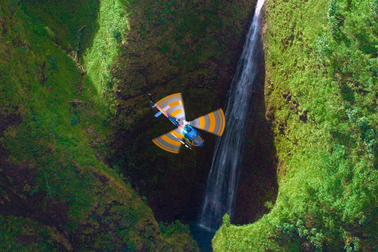 the beauty of sacred falls oahu rainbow helicopters