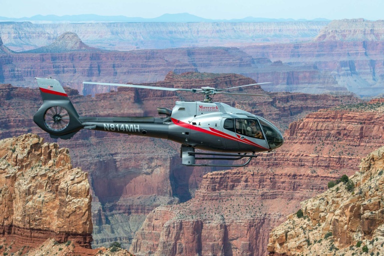 maverickhelicopter colors canyons tour helicopter flying through 