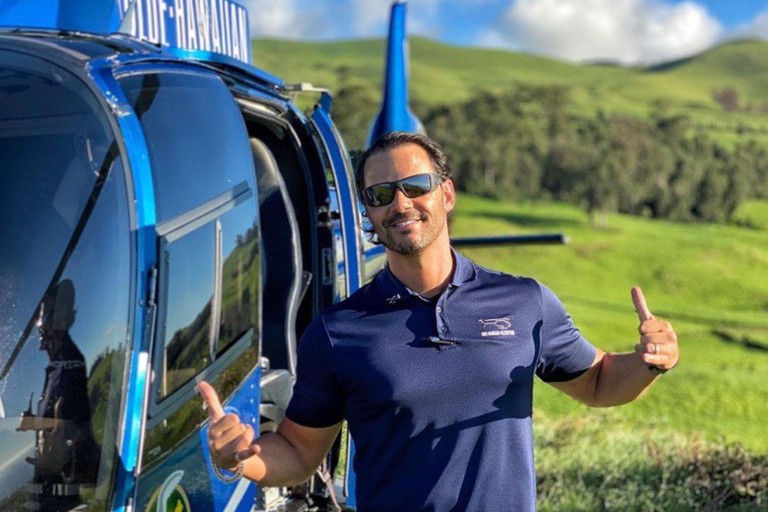 captionbluehawaiian fly over hilo waterfalls cliffs and valleys our feature guide man helicopter